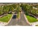 Aerial view of community entrance and surrounding homes at 10968 Fintry Hills St, Las Vegas, NV 89141