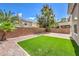 Artificial turf and block wall create a private backyard at 10968 Fintry Hills St, Las Vegas, NV 89141