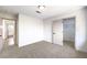 Spacious bedroom with neutral walls and carpet, and a closet at 10968 Fintry Hills St, Las Vegas, NV 89141