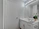 Modern bathroom with white vanity and updated fixtures at 1167 Vacation Valley Ave, Las Vegas, NV 89183