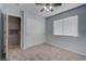 Bright bedroom featuring a ceiling fan and large closet at 1167 Vacation Valley Ave, Las Vegas, NV 89183