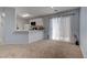 Kitchen with breakfast bar and access to patio at 1167 Vacation Valley Ave, Las Vegas, NV 89183