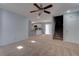 Living room with view into kitchen and stairs at 1167 Vacation Valley Ave, Las Vegas, NV 89183