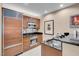 Modern kitchen with stainless steel appliances and breakfast bar at 135 E Harmon Ave # 2501, Las Vegas, NV 89109