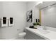 Modern bathroom with gray vanity, quartz countertop, and stylish decor at 135 Harmonica Ave # Lot 18, Henderson, NV 89011