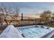 Relaxing hot tub with a view of the golf course and the desert landscape at 138 Reflection Cove Dr, Henderson, NV 89011