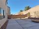 Large backyard with patio and block wall at 1404 Crystal Rainey Ave, North Las Vegas, NV 89086