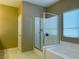 Bathroom with shower and tub at 1404 Crystal Rainey Ave, North Las Vegas, NV 89086