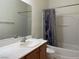 Bathroom with a tub, shower, and single vanity at 1404 Crystal Rainey Ave, North Las Vegas, NV 89086