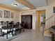 Formal dining room with wood table and chairs, and a hutch at 1404 Crystal Rainey Ave, North Las Vegas, NV 89086