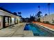 Modern home with a view of the refreshing pool at 1558 Aztec Way, Las Vegas, NV 89169