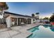 Modern home with a view of the refreshing pool at 1558 Aztec Way, Las Vegas, NV 89169