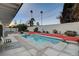 Inviting backyard oasis with a sparkling pool and patio area at 1558 Aztec Way, Las Vegas, NV 89169