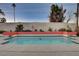 Clean lines and turquoise water highlight this mid-century modern pool at 1558 Aztec Way, Las Vegas, NV 89169