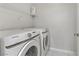 Bright laundry room, complete with washer and dryer at 1900 High Valley Ct # 104, Las Vegas, NV 89128