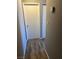 Clean hallway with wood-look floors and neutral walls at 2072 Mesquite Ln # 104, Laughlin, NV 89029