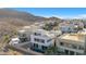 Community of modern homes nestled against a mountain backdrop at 232 Errogie St, Henderson, NV 89012