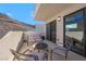 Private balcony with seating area and mountain views at 232 Errogie St, Henderson, NV 89012