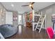 Bright bedroom with built-in loft bed, workspace, and hardwood floors at 232 Errogie St, Henderson, NV 89012