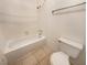 Clean bathroom with shower/tub combo and tiled floors at 2386 Pickwick Dr, Henderson, NV 89014