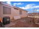 Backyard view with AC unit and small yard at 2419 Country Valley Ct, North Las Vegas, NV 89030