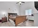 Spacious bedroom with large bed and window at 2419 Country Valley Ct, North Las Vegas, NV 89030