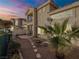 Spacious backyard with stone pathway and landscaping at 2521 Seascape Dr, Las Vegas, NV 89128