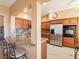 Kitchen with granite countertop and island, stainless steel appliances at 2521 Seascape Dr, Las Vegas, NV 89128