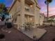 Private patio with seating area and lovely landscaping at 2521 Seascape Dr, Las Vegas, NV 89128