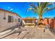 Backyard patio with pergola and palm trees at 2608 Spear St, North Las Vegas, NV 89030