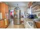 Kitchen with stainless steel appliances and wood cabinets at 2608 Spear St, North Las Vegas, NV 89030