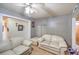 Living room with two sofas and a ceiling fan at 2608 Spear St, North Las Vegas, NV 89030