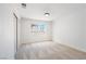 Well-lit bedroom with a large window and carpet flooring at 2632 Cathedral Ln, Las Vegas, NV 89108