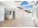 Bright dining area with hardwood floors and access to kitchen at 2632 Cathedral Ln, Las Vegas, NV 89108