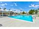 Community pool with ample deck space and seating at 2632 Cathedral Ln, Las Vegas, NV 89108