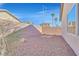 Backyard with gravel and a small flagstone patio at 2812 Dotted Wren Ave, North Las Vegas, NV 89084