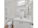 Clean bathroom with single vanity, toilet and bathtub at 2812 Dotted Wren Ave, North Las Vegas, NV 89084