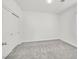 Spacious bedroom with grey carpet and double door closet at 2812 Dotted Wren Ave, North Las Vegas, NV 89084