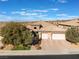 Single-story home with three-car garage and desert landscaping at 2837 Josephine Dr, Henderson, NV 89044