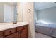 Bathroom with vanity, sink, and view of bedroom at 2837 Josephine Dr, Henderson, NV 89044