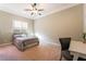 Bright bedroom with carpeted floor and workspace at 2837 Josephine Dr, Henderson, NV 89044