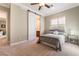 Bedroom with sliding barn door and carpeted floor at 2837 Josephine Dr, Henderson, NV 89044