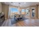 Bright dining room with large windows and chandelier at 2837 Josephine Dr, Henderson, NV 89044