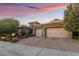 Two-story home with brick driveway and landscaping at 2837 Josephine Dr, Henderson, NV 89044