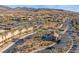 Gated entrance to the community with palm trees and landscaping at 2837 Josephine Dr, Henderson, NV 89044