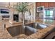 Kitchen island with double sink and granite countertop at 2837 Josephine Dr, Henderson, NV 89044