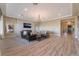 Bright living room with hardwood floors and a marble fireplace at 2837 Josephine Dr, Henderson, NV 89044