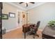 Home office with wooden desk and leather chair at 2837 Josephine Dr, Henderson, NV 89044