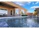 Inviting pool with water feature and adjacent patio at 2837 Josephine Dr, Henderson, NV 89044