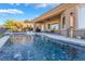 Luxury pool with spacious patio and lounge chairs at 2837 Josephine Dr, Henderson, NV 89044